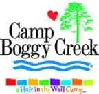 Camp Boggy Creek logo with a tree, heart, and wavy lines.