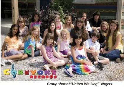 Group of young singers for "United We Sing" pose for a photo.