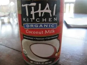 Can of Thai Kitchen Organic Coconut Milk with a close-up view of the label.