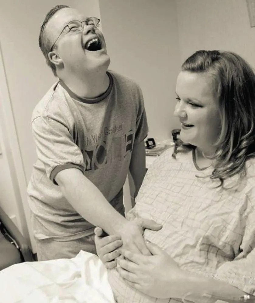 Christian and Mandy laughing together.