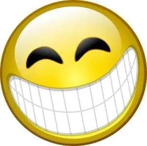 A yellow smiley face with closed eyes and a wide, toothy grin.