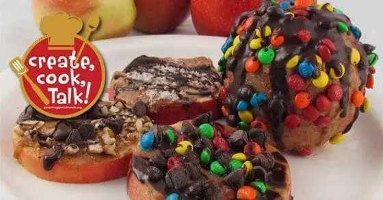 Chocolate caramel apple cookies topped with chocolate chips and M&Ms.