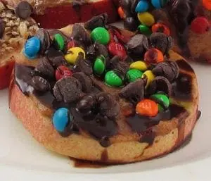Caramel apple cookie topped with chocolate chips and M&Ms
