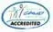 Oval logo with text "The Choice Accredited