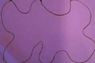 A purple paper with a drawn outline of a large flower shape.