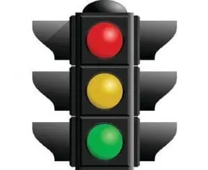 Traffic light with red, yellow, and green lights illuminated