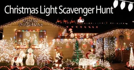 Christmas lights illuminate a house decorated with snowmen, trees, and reindeer.