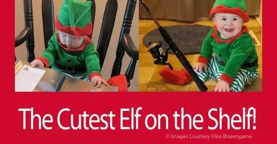 Baby dressed as an elf sits in a chair and on the floor next to a fishing pole.