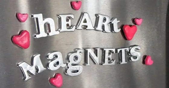 Heart Magnets craft in pink and silver on a metallic surface.