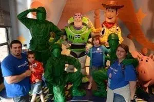 Elijah, Jaycee and Evana with Toy Story characters.