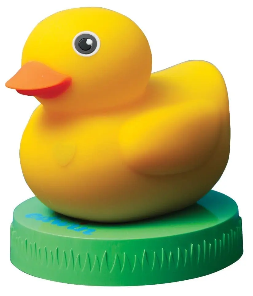 Soapet toy duck on a green base.