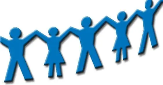 Blue paper cutouts of people holding hands in a line.