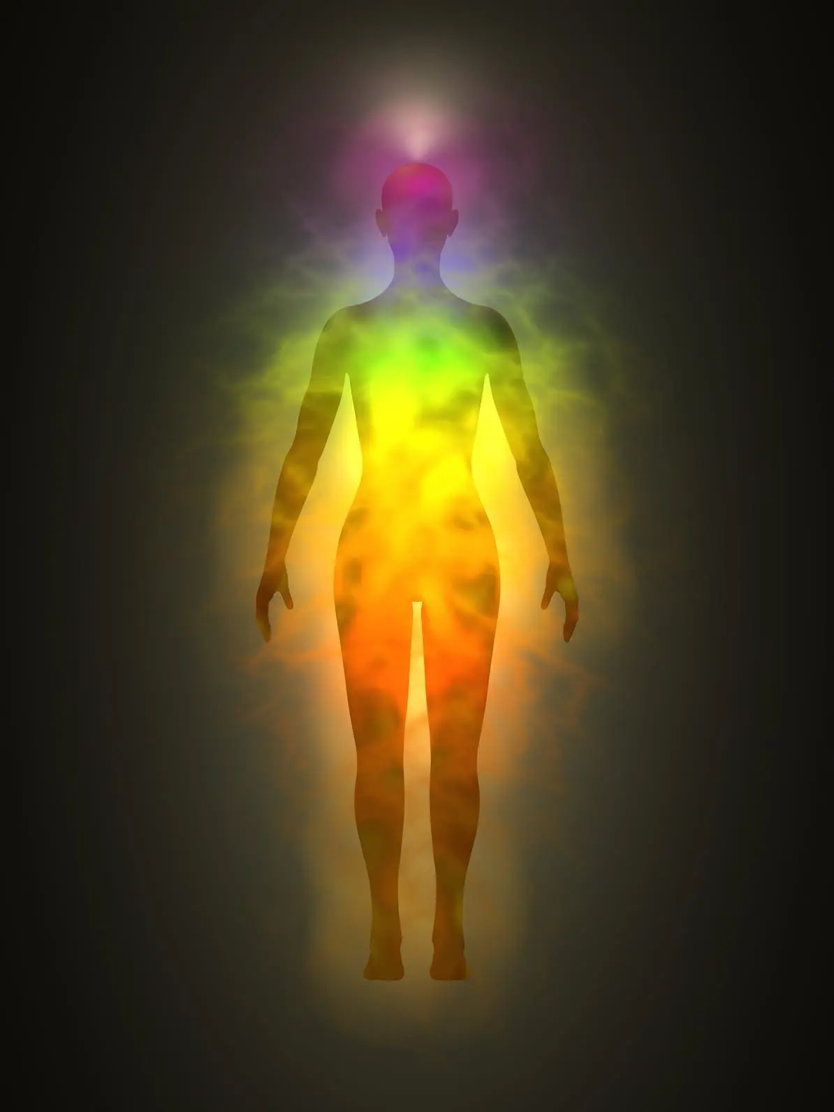 Human energy body with colorful aura and chakras