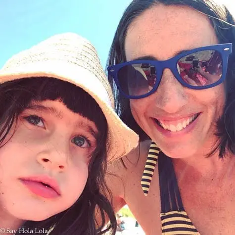 Lola and Meridith in hats and sunglasses.