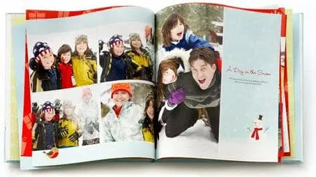 Photo album with images of children playing in the snow.
