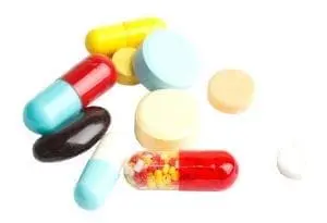 Pile of assorted prescription pills and capsules.