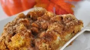 Slice of pumpkin french toast bake with a fork.