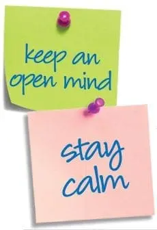 Two sticky notes, one green with "keep an open mind" and one pink with "stay calm