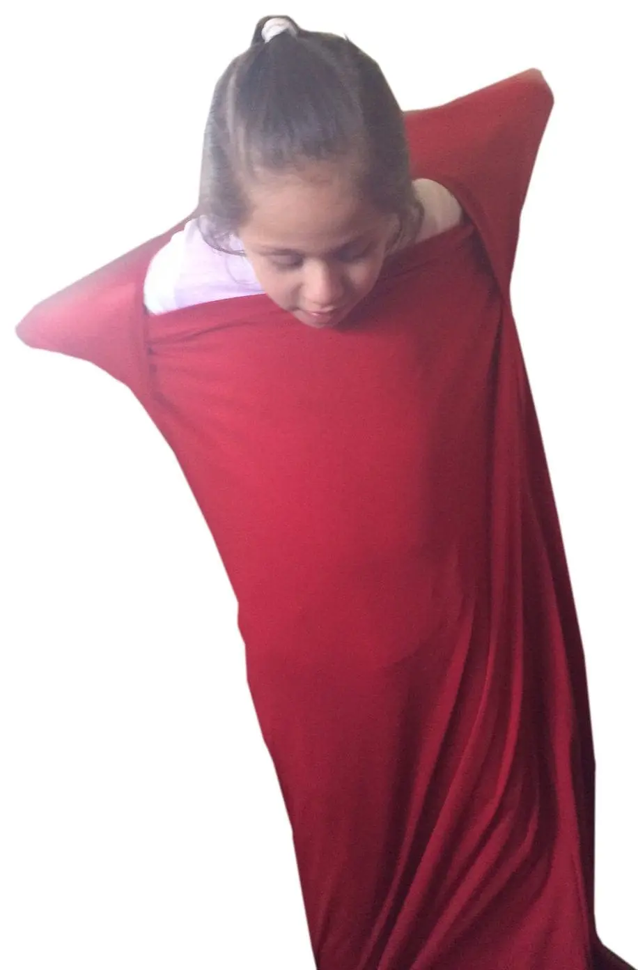 Child inside a red sensory sock.