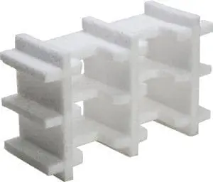 White styrofoam block with interlocking sections.