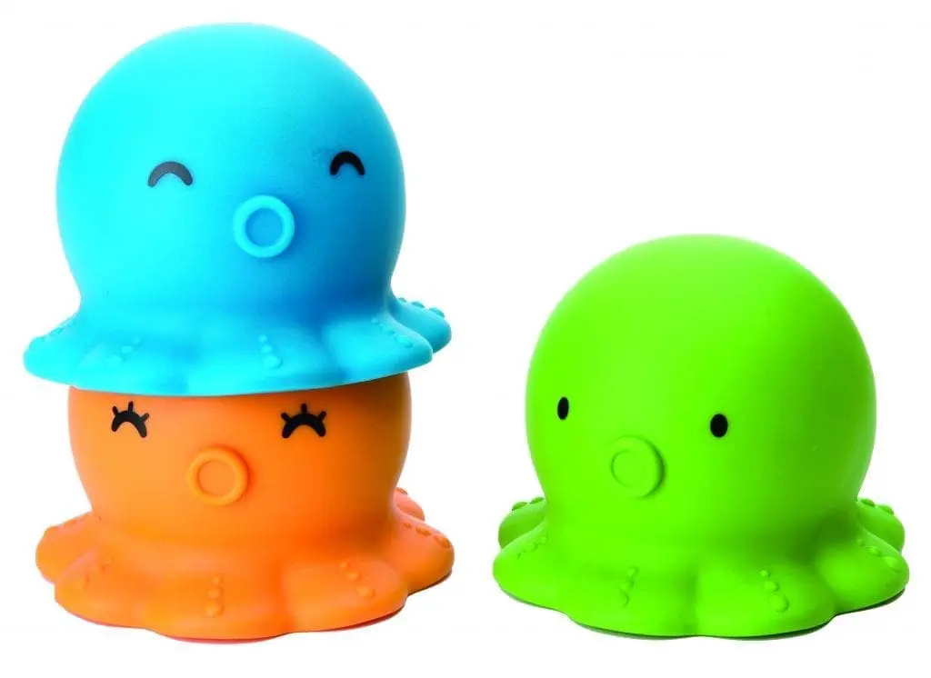 Two octopus-shaped bath toys, one blue stacked on an orange one, and a green one to the side.