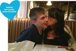 Michele kisses Sammy on the cheek.