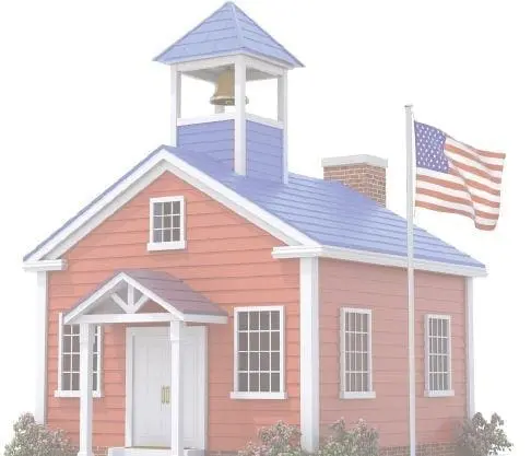 A small red schoolhouse with a blue roof and a bell tower, flying an American flag.