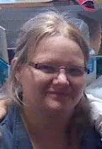 Maria Corwin Hall wearing glasses.