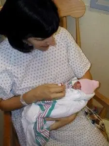 Deb Discenza holding a baby.