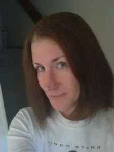 Chynna Laird wearing a white t-shirt.