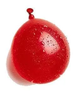 Red water balloon covered in water droplets.