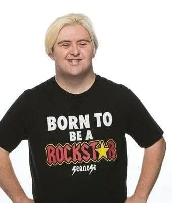 Sean McElwee wearing a black t-shirt that says "Born to be a Rock Star