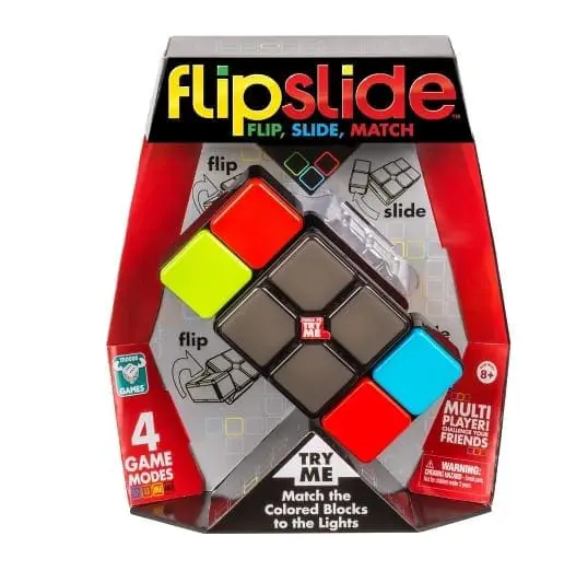 Flipslide electronic puzzle game in packaging featuring four game modes and colorful sliding blocks.