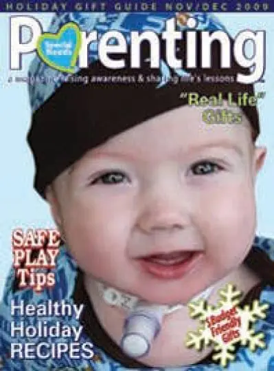 Parenting magazine cover featuring a baby with a medical device.