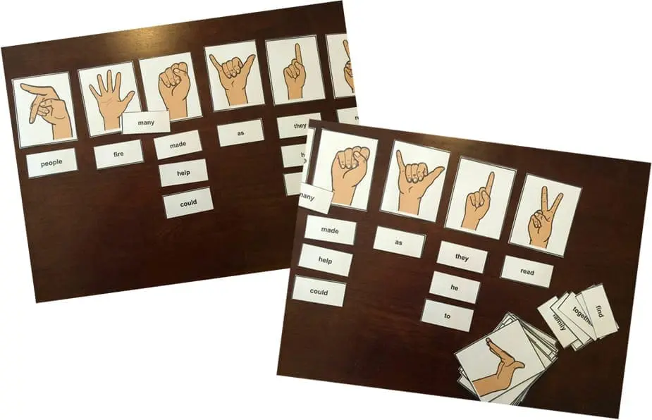 Cards with images of hand signs and text labels on a dark surface.