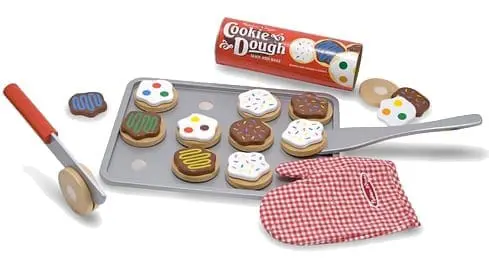 Melissa & Doug Slice and Bake Cookie set with toy cookies on a baking sheet