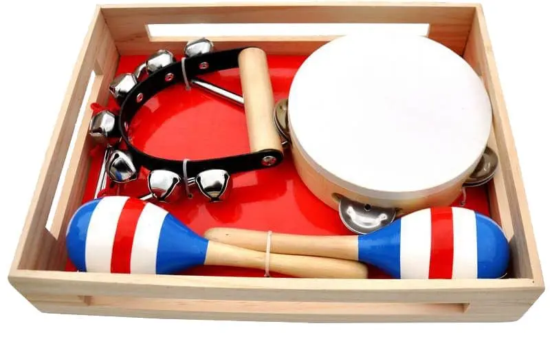 Wooden tray with maracas, tambourine, and drum.
