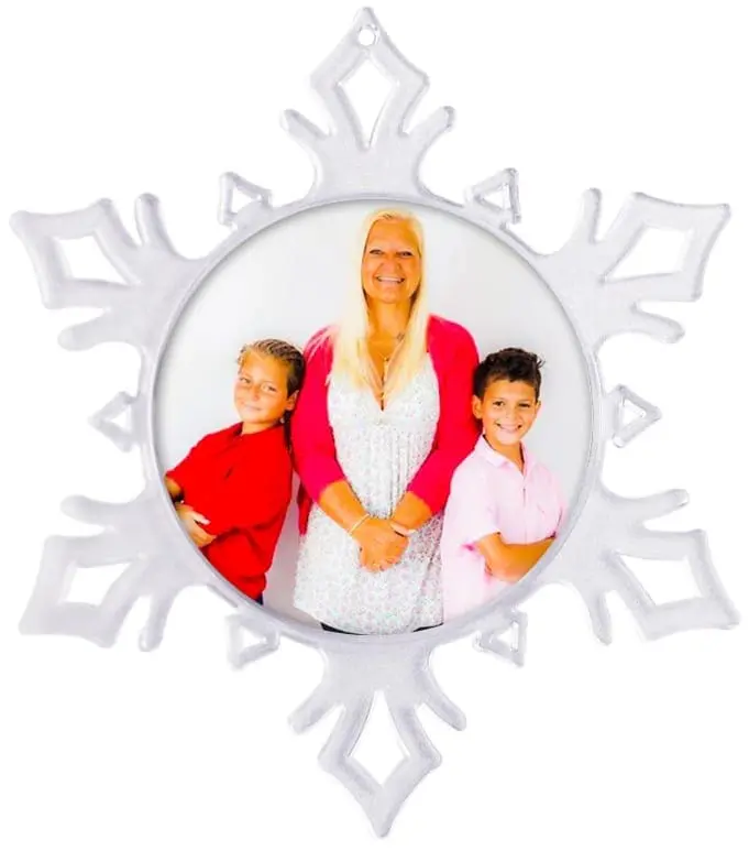 Elisha with two children in a snowflake frame.
