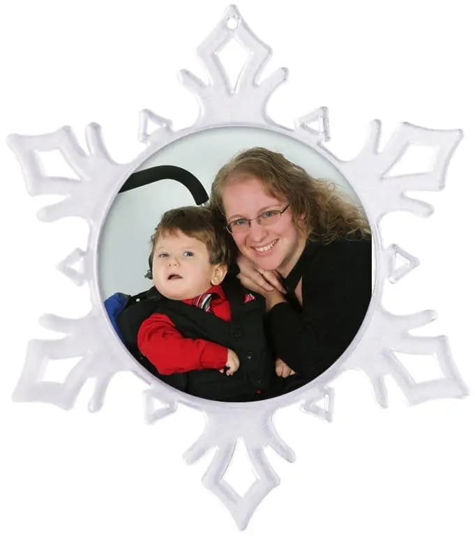 Tracy Felix and her son in a snowflake-shaped frame.