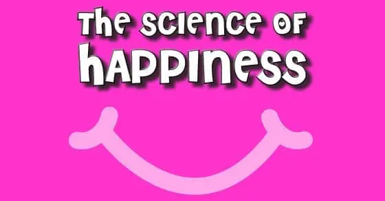 The science of happiness text on a pink background with a smiley face.