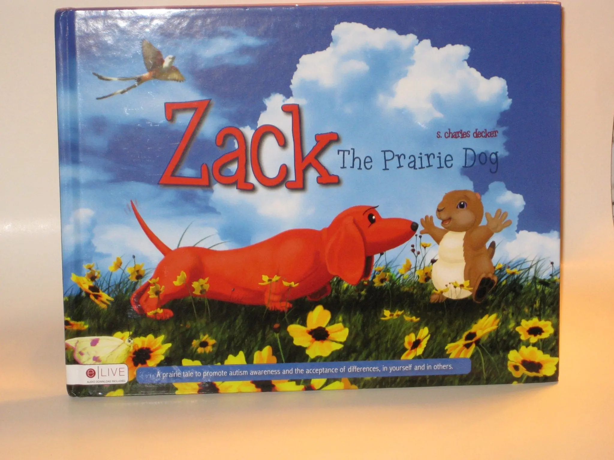 Zack The Prairie Dog children's book cover with prairie dog and orange dog.