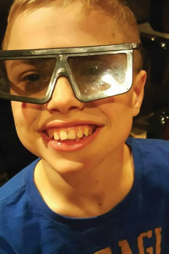 Benjamin Thompson smiling wearing large novelty glasses.