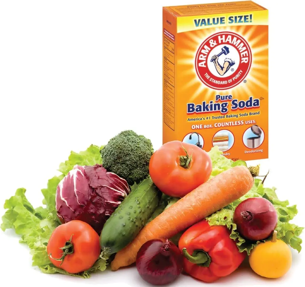 Baking soda box and assortment of fresh produce