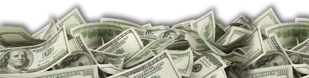 Pile of US one-hundred dollar bills