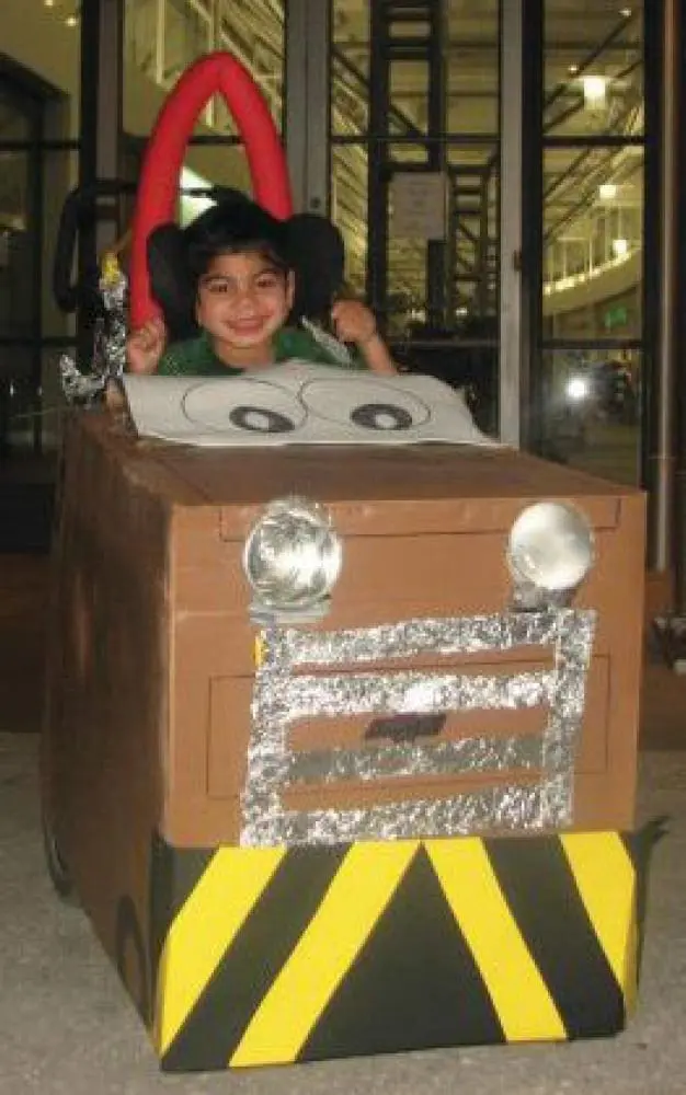 Marcos wearing a Mater costume.