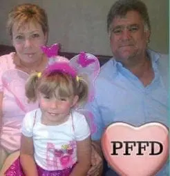 The Beukes family poses for a photo.