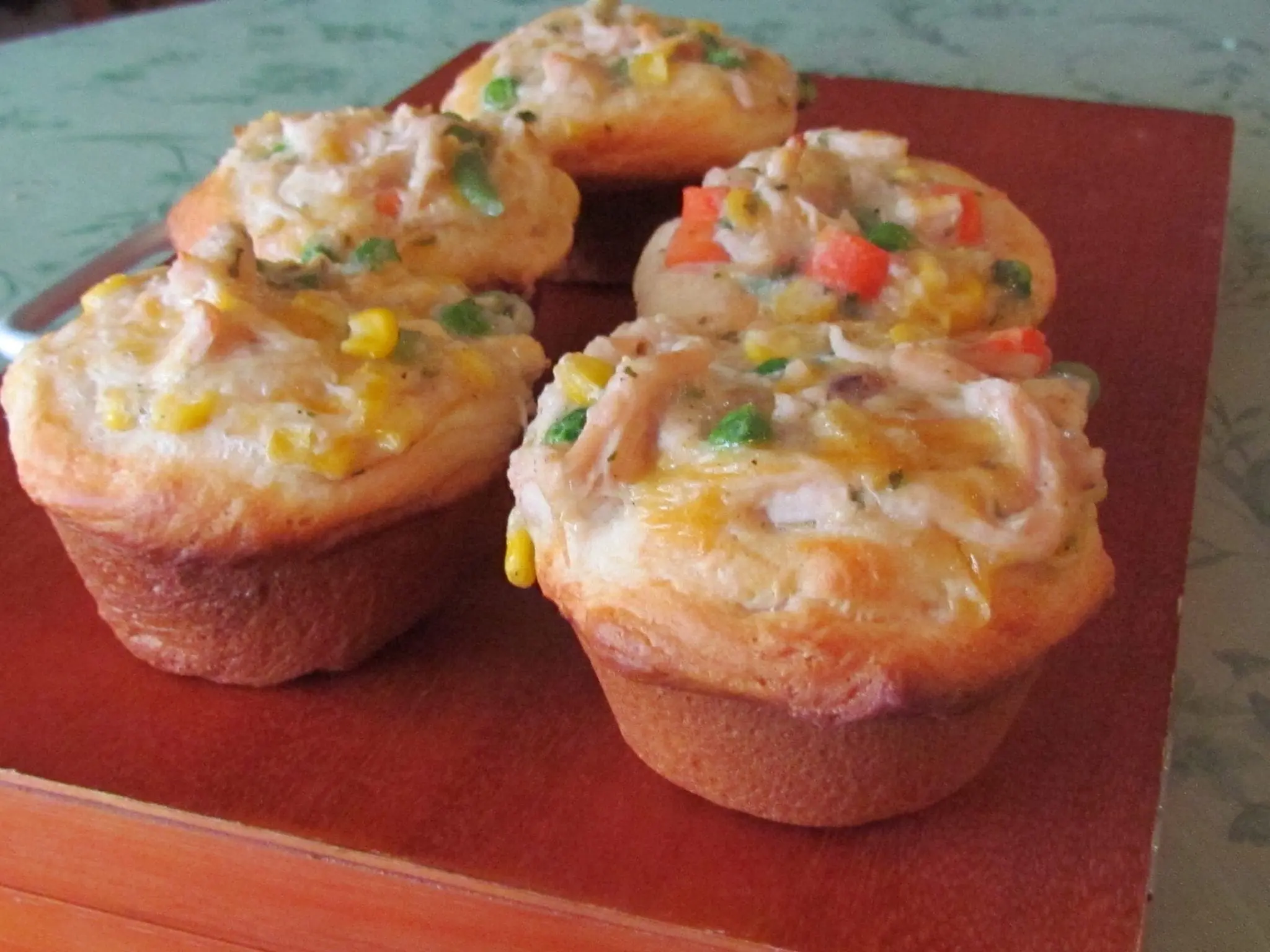Chicken Pot Pie Cupcakes on a red tray