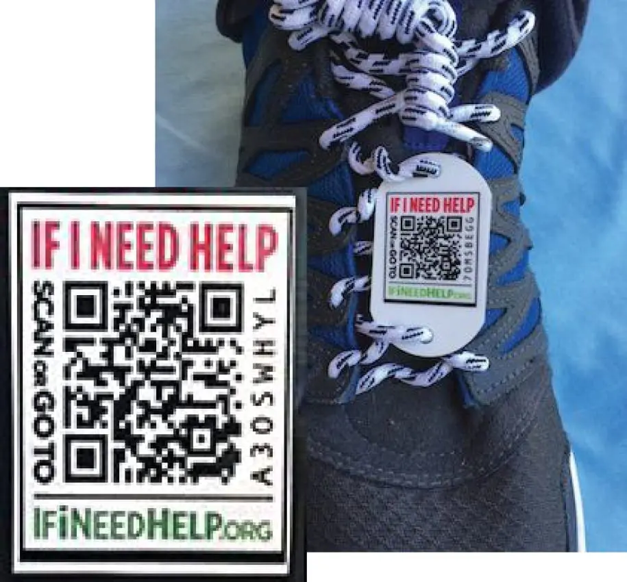 Tag on a shoe with a QR code and text that says "IF I NEED HELP SCAN OR GOTO IFINEEDHELP.ORG