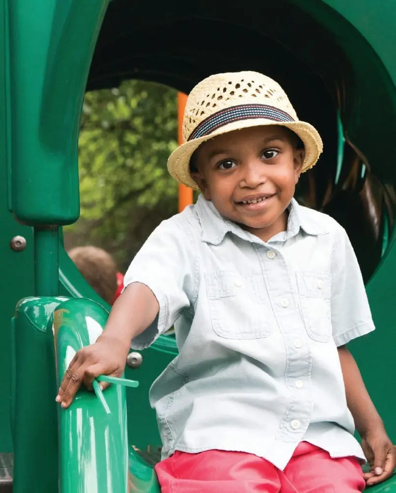 Kole Thomas Garrett wearing a hat and smiling.