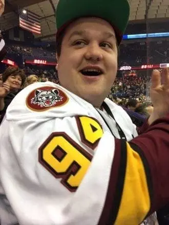 Tom Petrik wearing a hockey jersey with the number 96